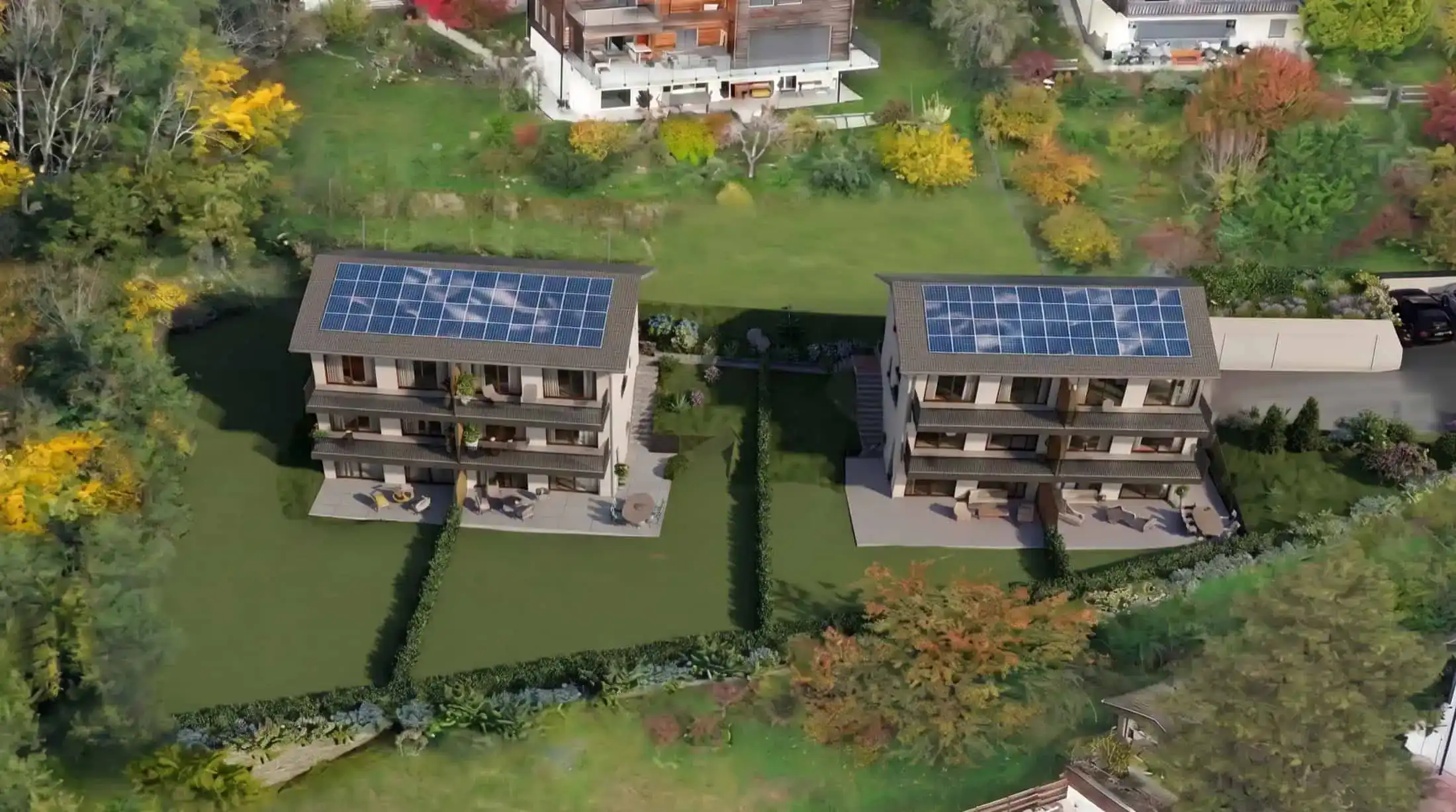 Luftaufnahme der Résidence La Tuilière mit Solarpanels und grüner Umgebung.